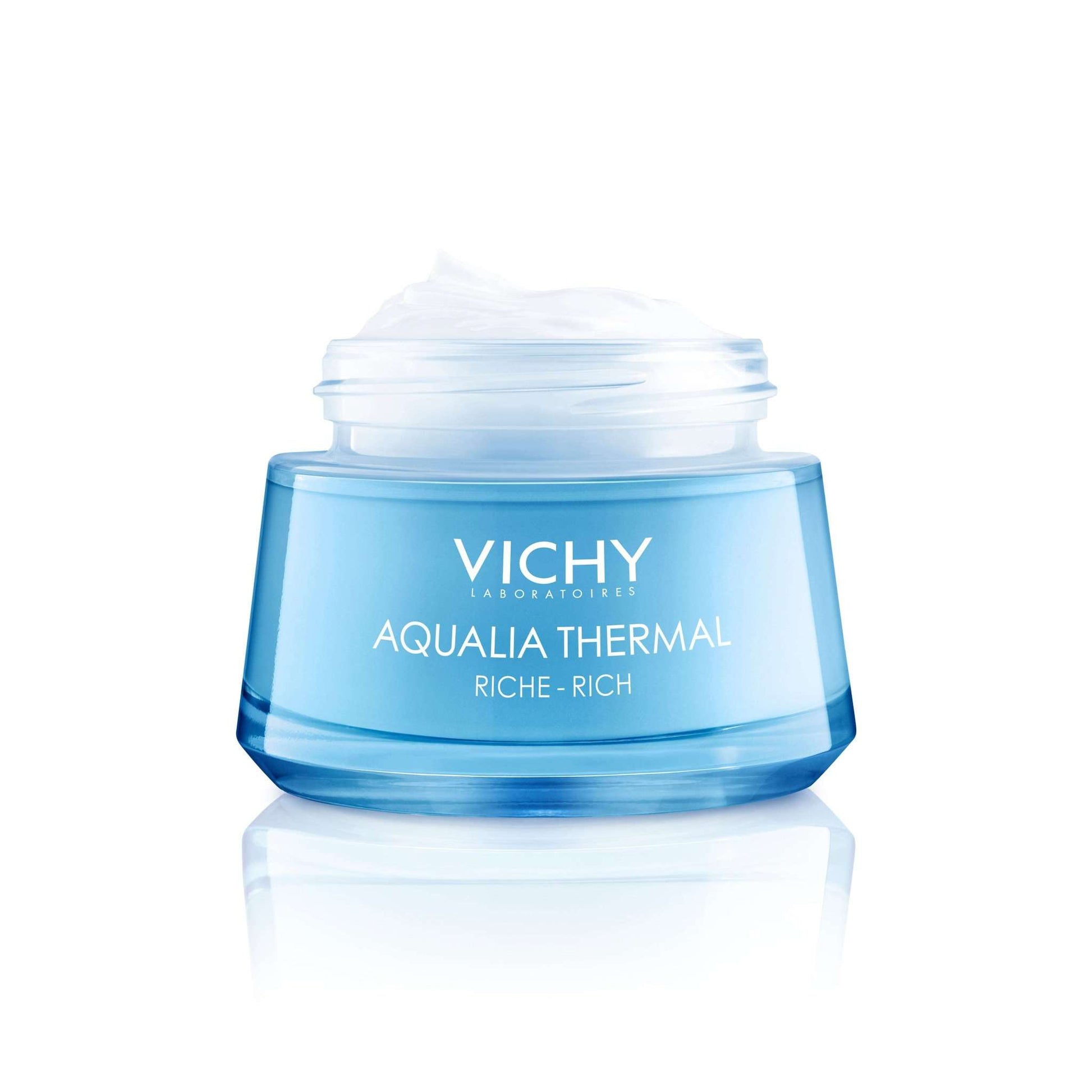Abgebildet ist ein blauer Tiegel der Hinterland Apotheke VICHY AQUALIA Thermal reichhaltige Creme/R mit weißem Deckel, der mit Hyaluron angereicherte Feuchtigkeitspflege enthält, vor weißem Hintergrund.