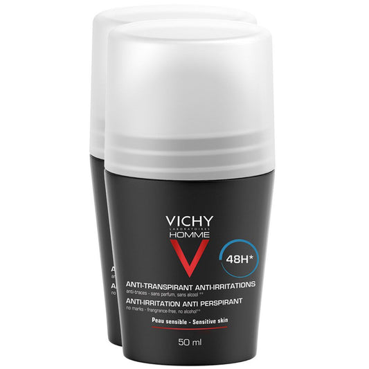 Zwei schwarze Flaschen VICHY HOMME DEODORANT ANTI-TRANSPIRANT EXTRA SENSITIV 48H DOPPELPACK von Hinterland Apotheke, mit weißem Verschluss und Text, für empfindliche Haut, sind leicht überlappend angeordnet.