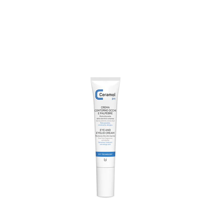 Eine weiße Tube CERAMOL AUGEN- UND AUGENLIDCREME 311 von Hinterland Apotheke steht aufrecht vor einem schlichten weißen Hintergrund, auf dem blauer und schwarzer Text die Unterstützung der Hautbarriere und die Eignung für allergiegefährdete Haut hervorheben.