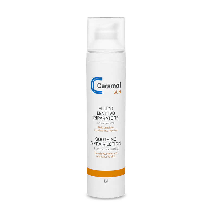 Eine weiße Flasche LINDERNDES REPAIR-FLUID mit einem Pumpspender. Das Etikett zeigt blaue und orange Schrift, ist parfümfrei, für empfindliche Haut geeignet und hilft, Rötungen auf empfindlicher oder reaktiver Haut zu lindern.