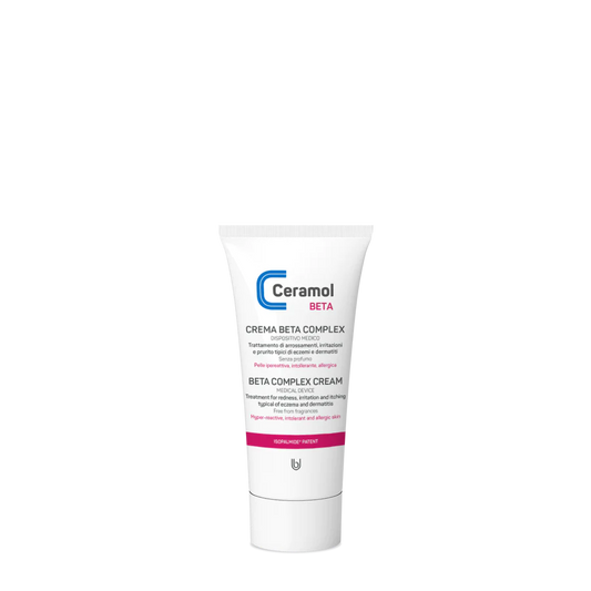 Eine weiße Tube CERAMOL BETA COMPLEX CREME von Hinterland Apotheke steht aufrecht auf weißem Grund, mit blauem und rosafarbenem Etikett und Flip-Top-Verschluss - ideal für Dermatitis Behandlung und Hautbarriere Wiederaufbau.