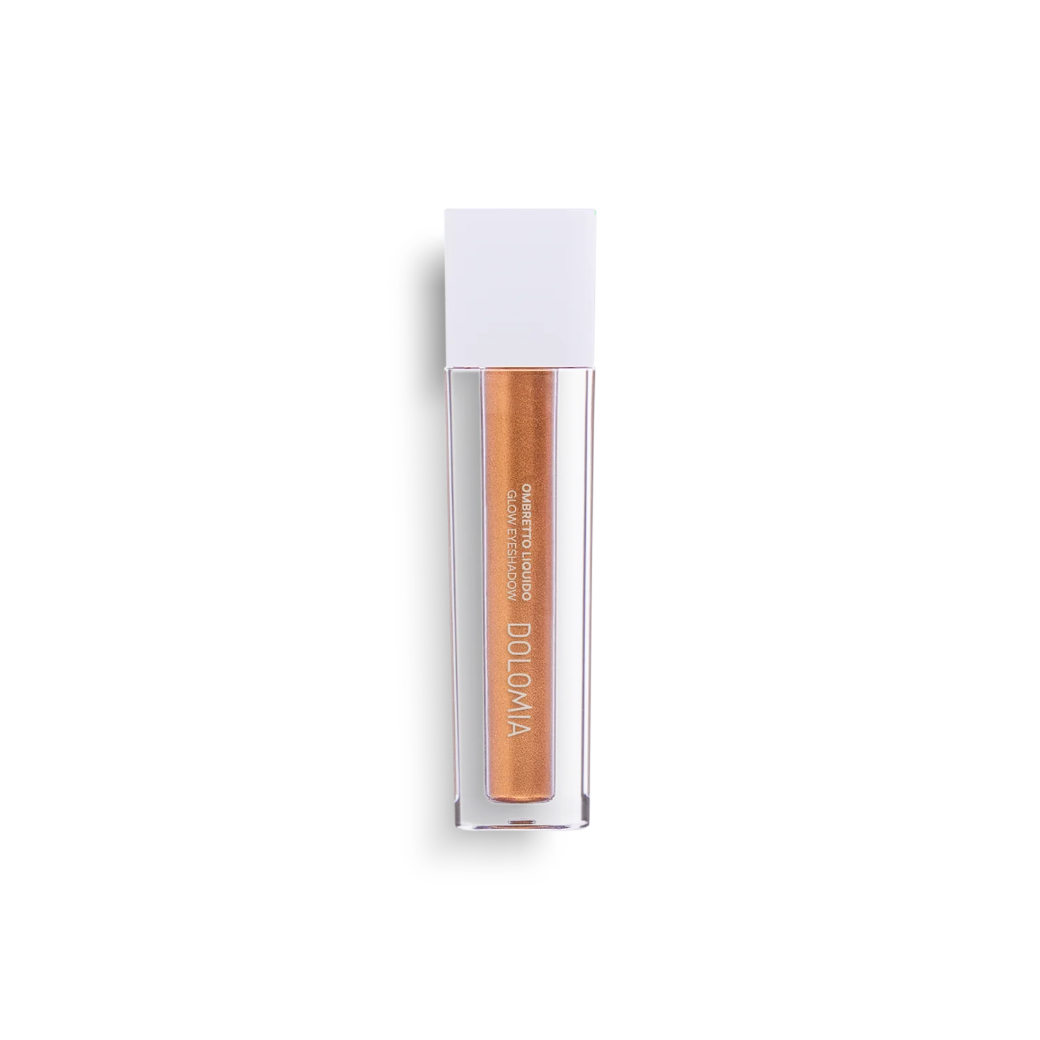 Eine Tube DOLOMIA Flüssiger Lidschatten (3 Farbvarianten), goldener Farbton mit weißer Kappe und "CREATED TO BLOOM" auf der transparenten Hülle, wird vor einem weißen Hintergrund für ein schimmerndes Finish präsentiert.