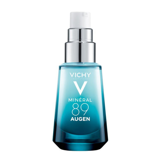 Eine blaue Glasflasche der Hinterland Apotheke Vichy Mineral 89 Augencreme mit silberner Pumpe und weißer Kappe mit weißem Branding - perfekt als täglicher Hyaluron Booster für die Pflege der Augenpartie.