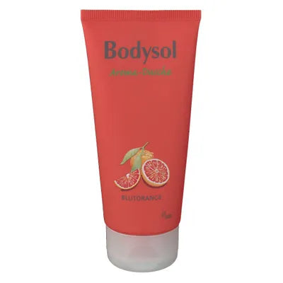 Eine rote Tube Bodysol Aromadusche BLUTORANGE zeigt auf der Vorderseite Abbildungen von aufgeschnittenen Blutorangen und grünen Blättern.