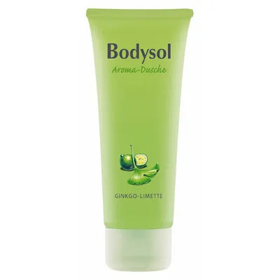 Eine grüne Tube Bodysol Aromadusche GINKGO-LIMETTE, mit Ginkgo- und Limettenmotiven, beschriftet mit GINKGO-LIMETTE und angereichert mit ätherischem Öl für ein pflegendes Duschgel-Erlebnis.