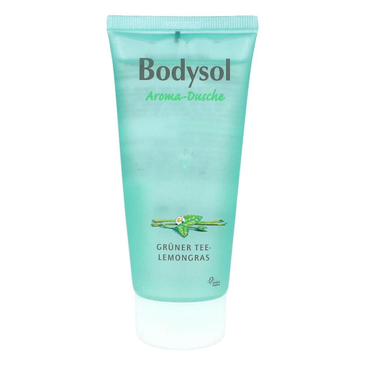 Eine türkisfarbene Tube Bodysol Aromadusche GRÜNER TEE-LEMONGRAS mit grünem Tee und Zitronengras, mit Abbildungen von Teeblättern und Zitronengras auf der Vorderseite. Der größte Teil des Textes ist in Deutsch.