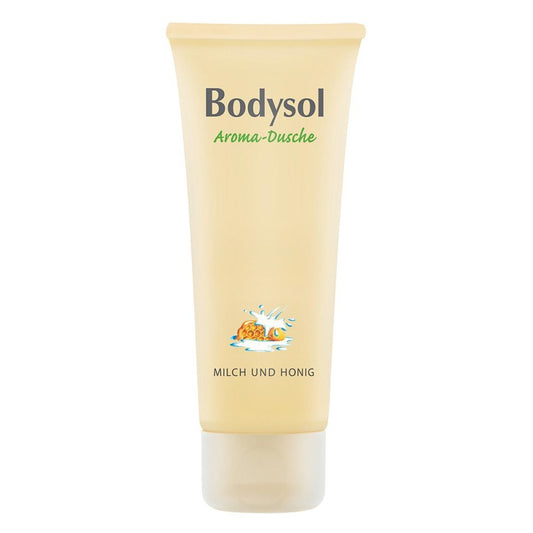 Die beigefarbene Tube des Duschgels Bodysol Aromadusche MILCH & HONIG mit Waben- und Milchspritzern auf der Vorderseite ist ideal für die sanfte Hautpflege.