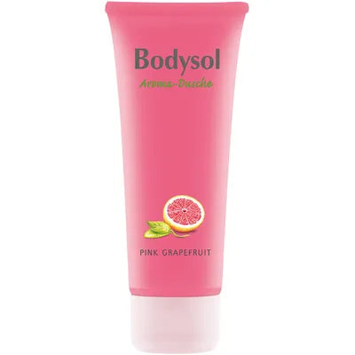Auf der rosafarbenen Tube mit der Aufschrift Bodysol Aromadusche PINK GRAPEFRUIT sind eine halbierte rosa Grapefruit und grüne Blätter abgebildet. Der Schriftzug "Pink Grapefruit Duschgel" am unteren Rand unterstreicht den erfrischenden Duft dieses pflegenden Duschgels.